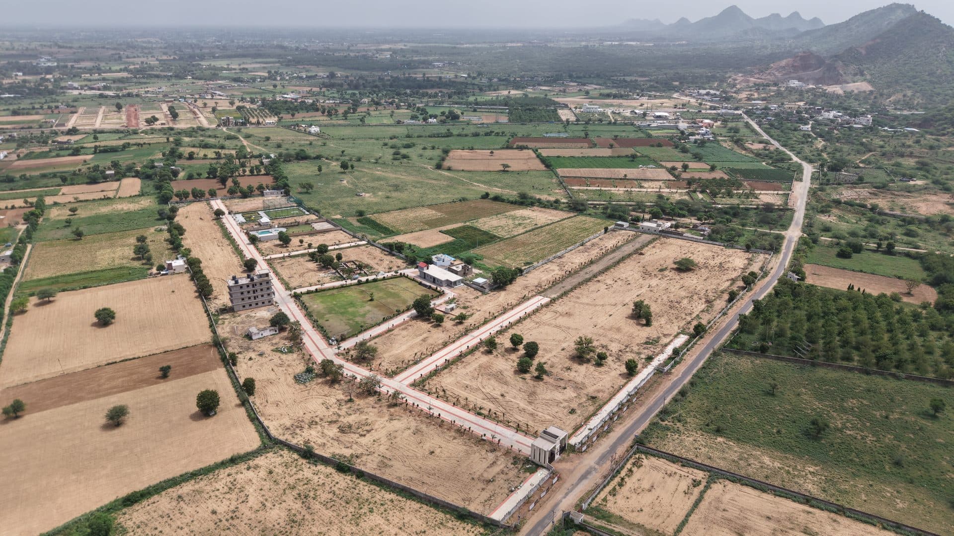 Anutham 94 — Aerial view towards the Aravalli hills, Pushkar